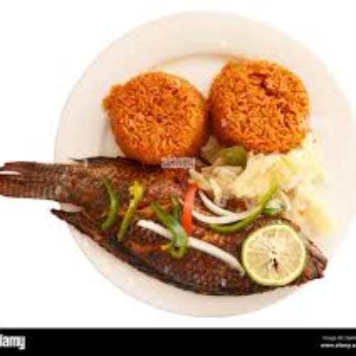 Grilled Tilapia with Ghana Jollof rice.