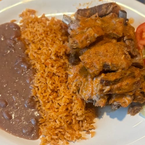 Costillas de Puerco (Pork Ribs in Sauce).