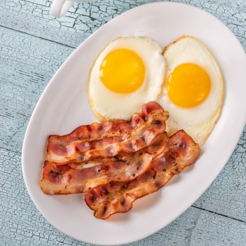 Waffle with 2 Eggs & Meat.