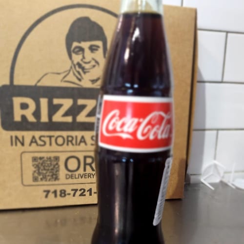 Glass Coca-Cola bottle.