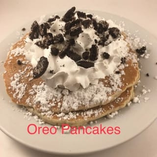 3 Oreo Pancakes Whipped Cream and Dusted with Powdered Sugar