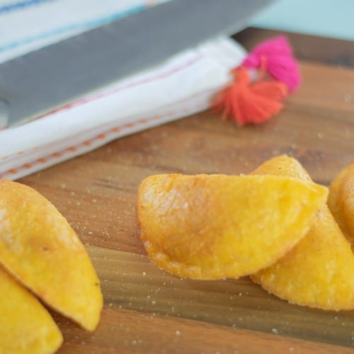 Pork & Cheesy Rice Empanada.