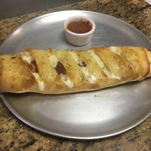 Stromboli Meat-lovers (Pepperoni, Sausage and Ham).