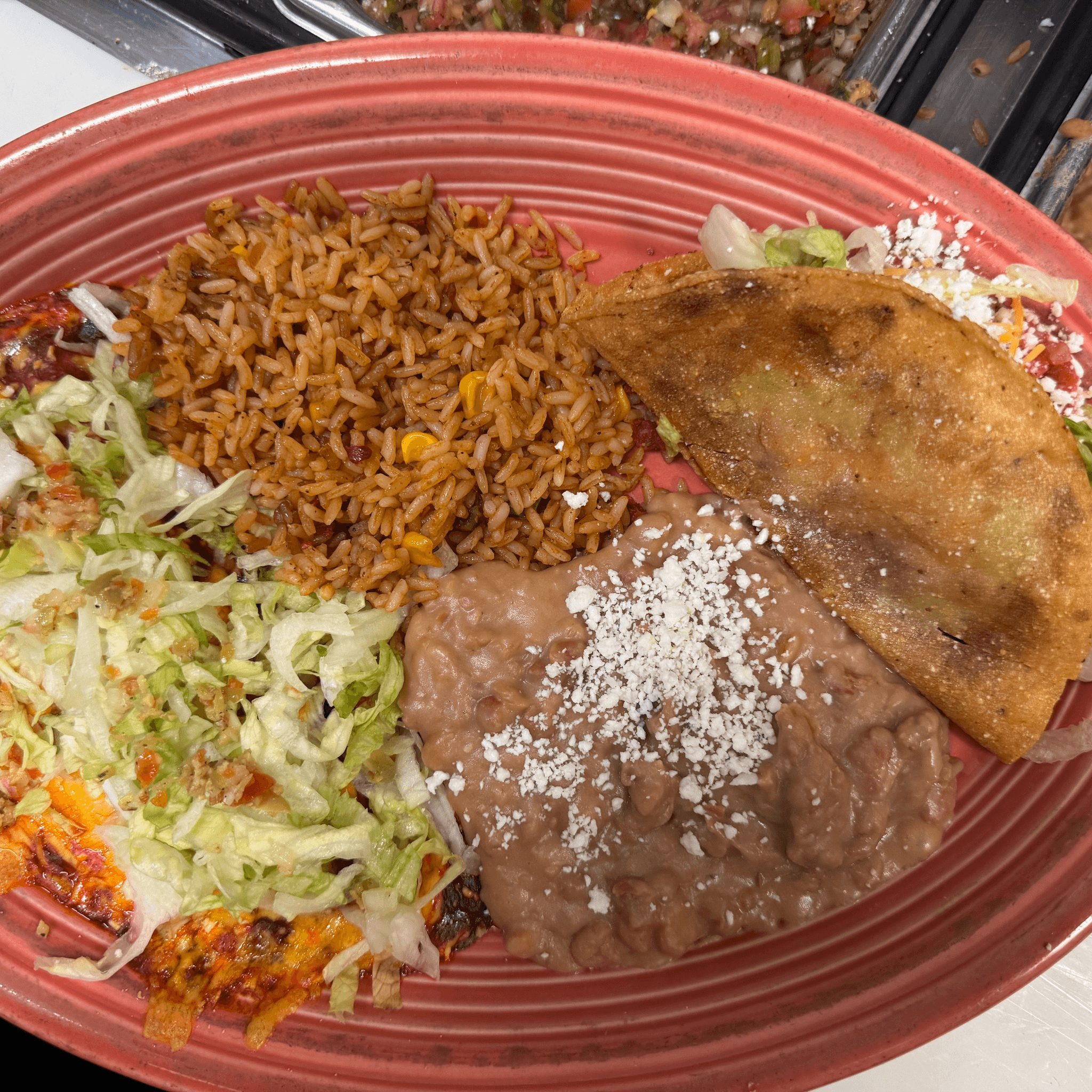 One Cheese Enchilada a Fried Taco Combo.