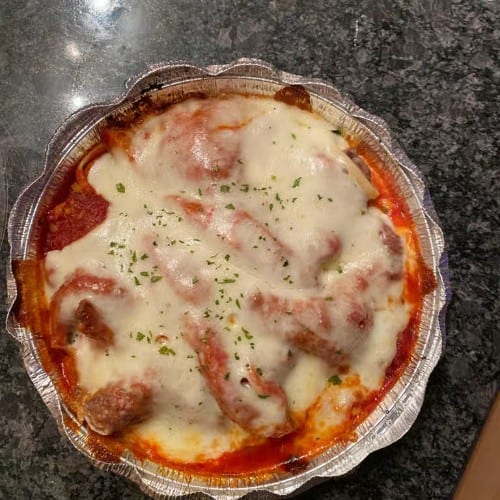 Breast of Chicken Parmigiana.