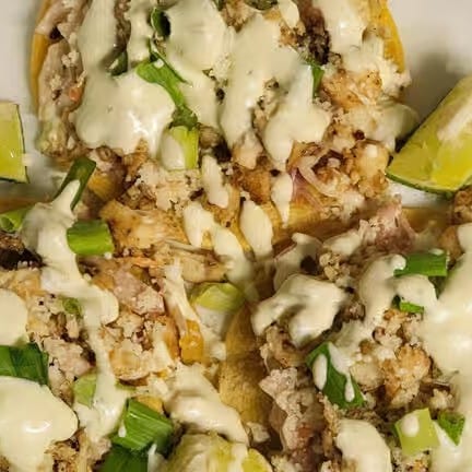 (3) Fish Tacos with Slaw & J's Sauce.