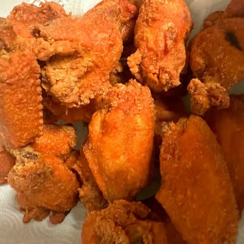 Spanish Style Chicken Wings Choice of Two Sides.