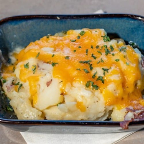 Tampa Joe's Signature Cheesy Mashed Red Skin Potatoes.