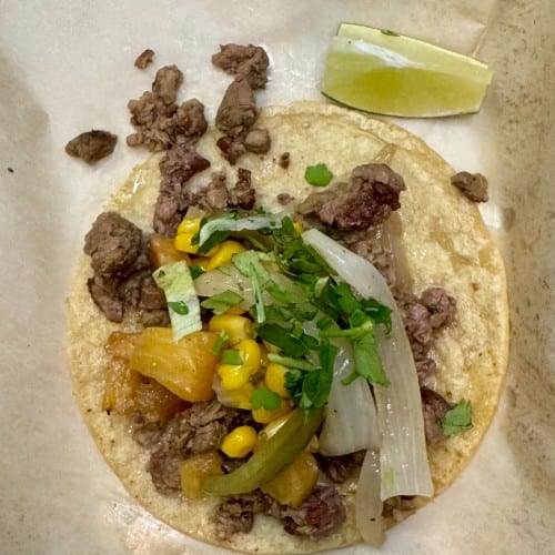 Taco Mamalon- Grilled veggies, including corn, pineapple, bell peppers, caramelized onions, fresh onions and cilantro..