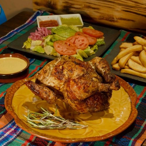 Two Whole Chickens & Four sides.