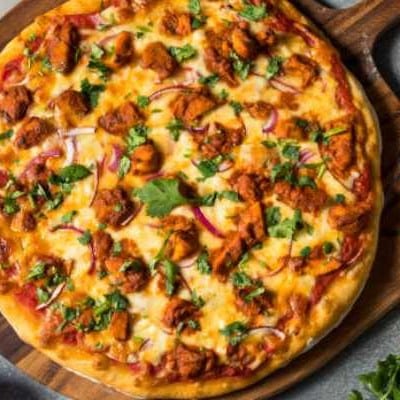 CHICKEN TIKKA PIZZA.
