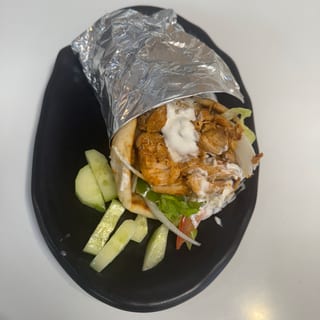 Grill Chicken Gyro Wrap ( Chicken,bread,Lettuce,tomato,,onion,pepper,sharjah Tzatziki Sauce)