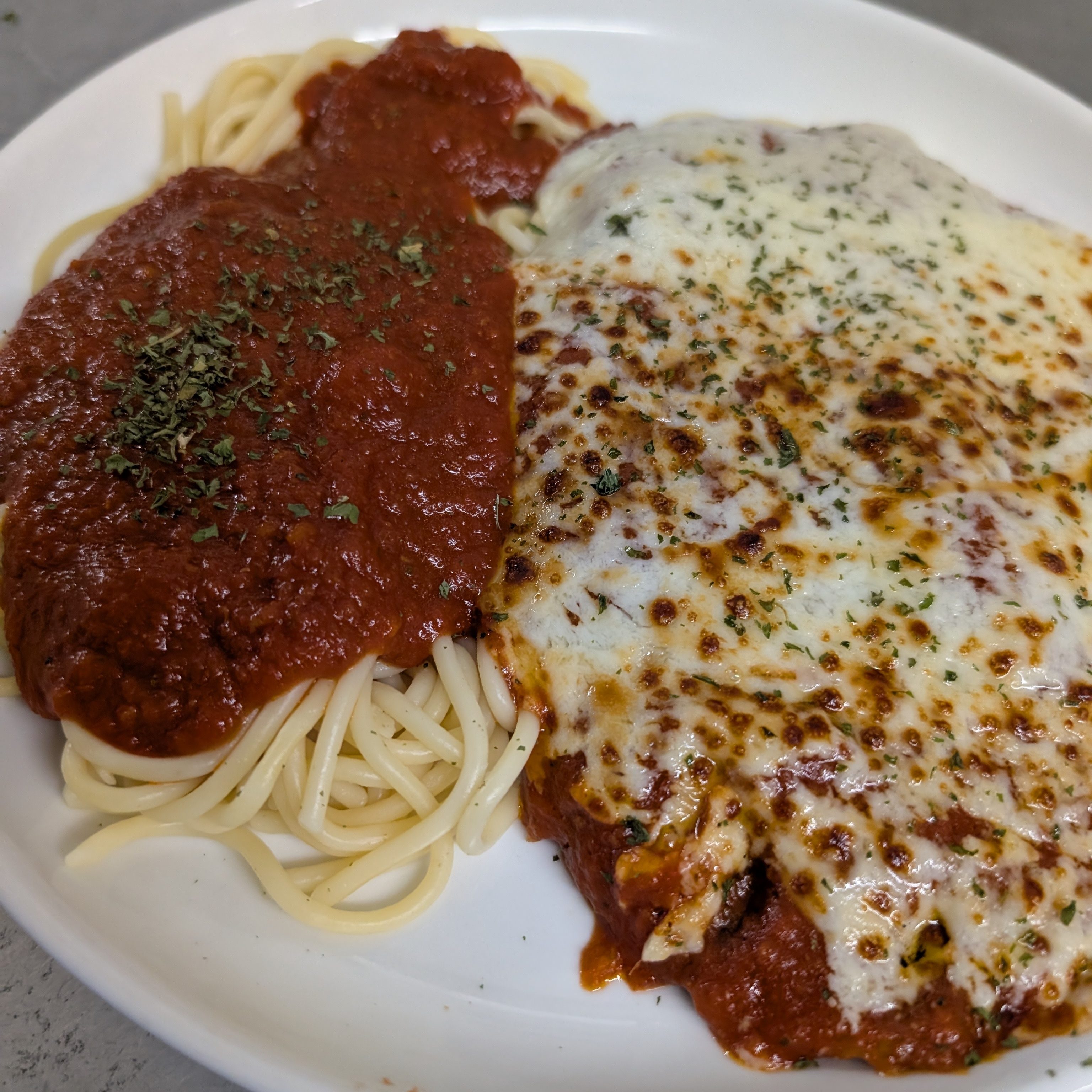 Chicken Breast Parmigiana.