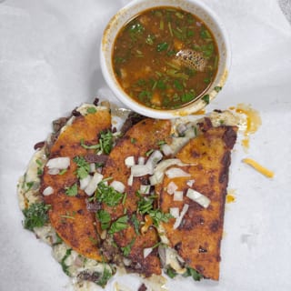 Tacos Birria de res (beef stew).