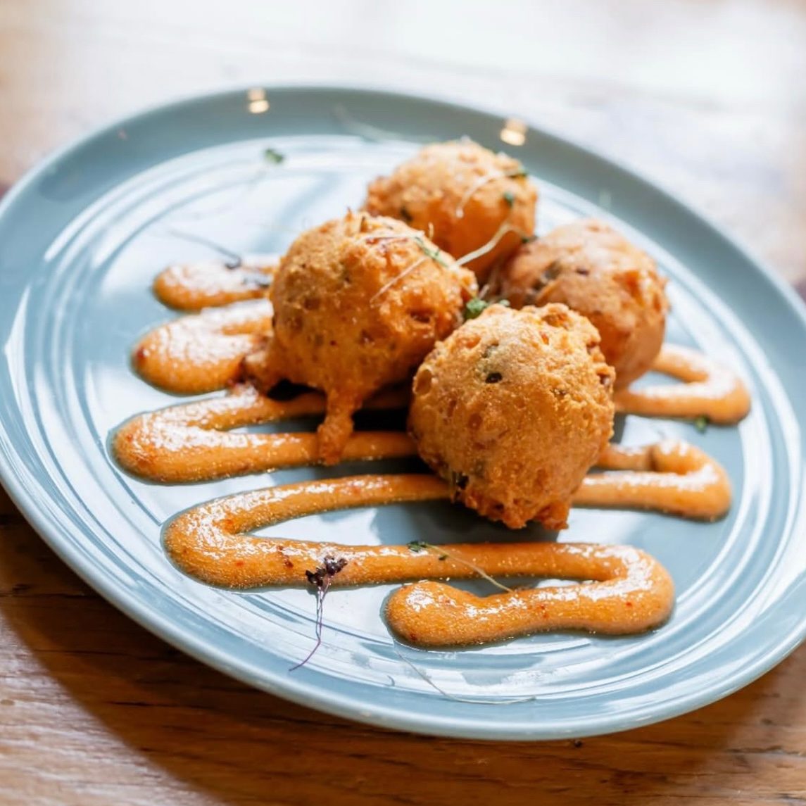 Sweet Potato & Tasso Ham Hush Puppies.