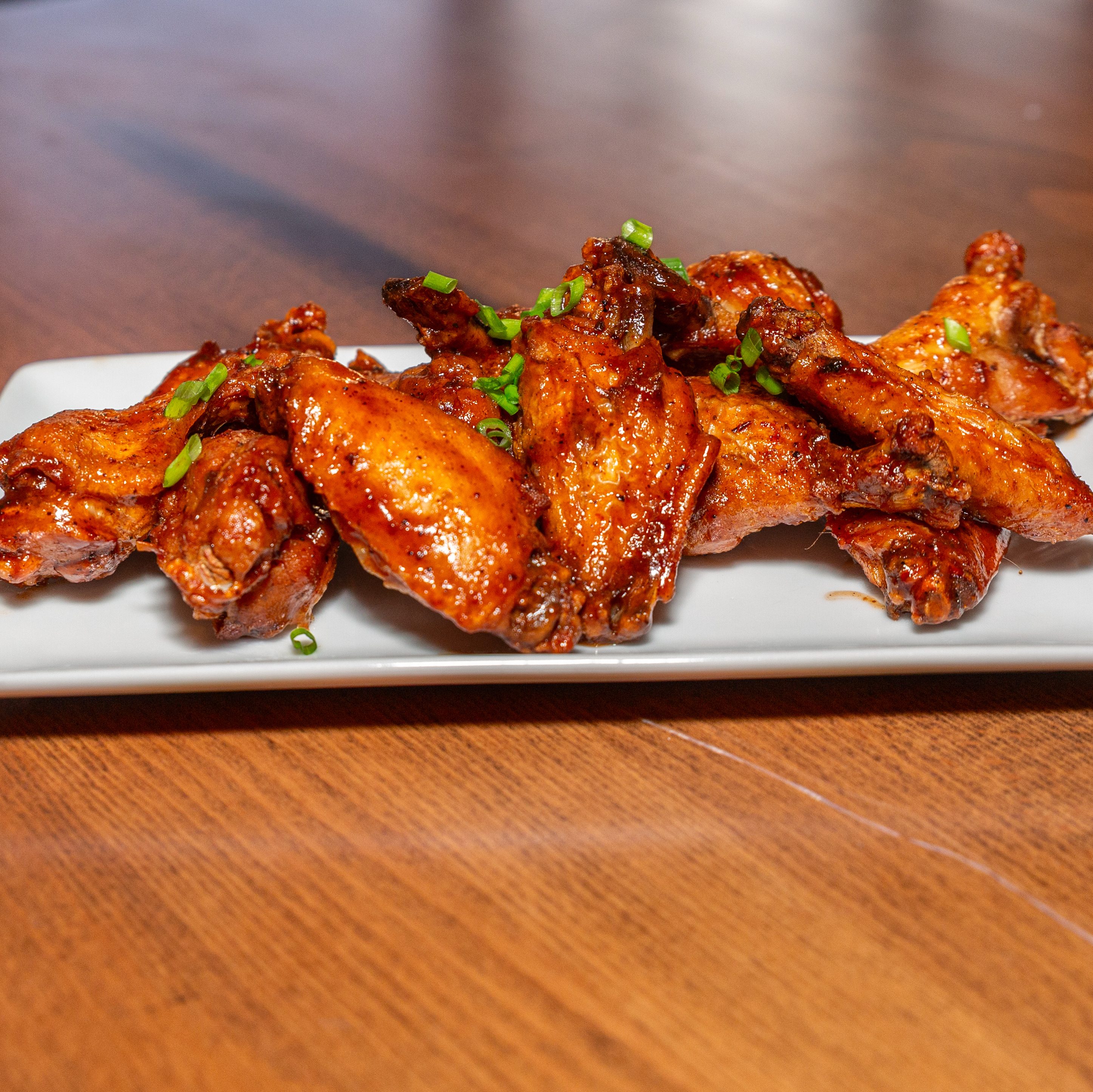 Signature Wings.