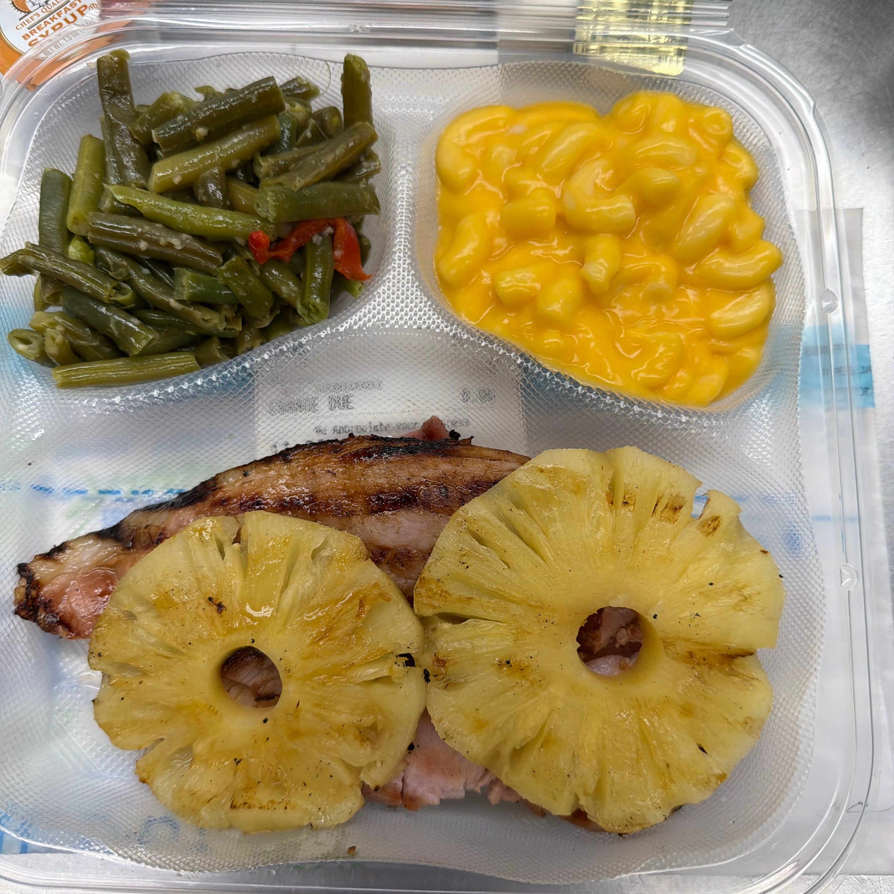 Honey Baked Ham with Sliced Pineapple Ring.