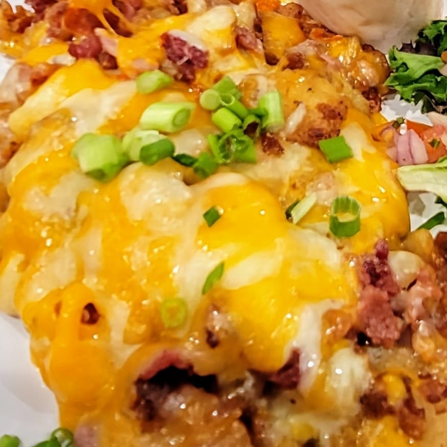 Loaded Home Fries w/Bacon, Cheddar and Green onions.