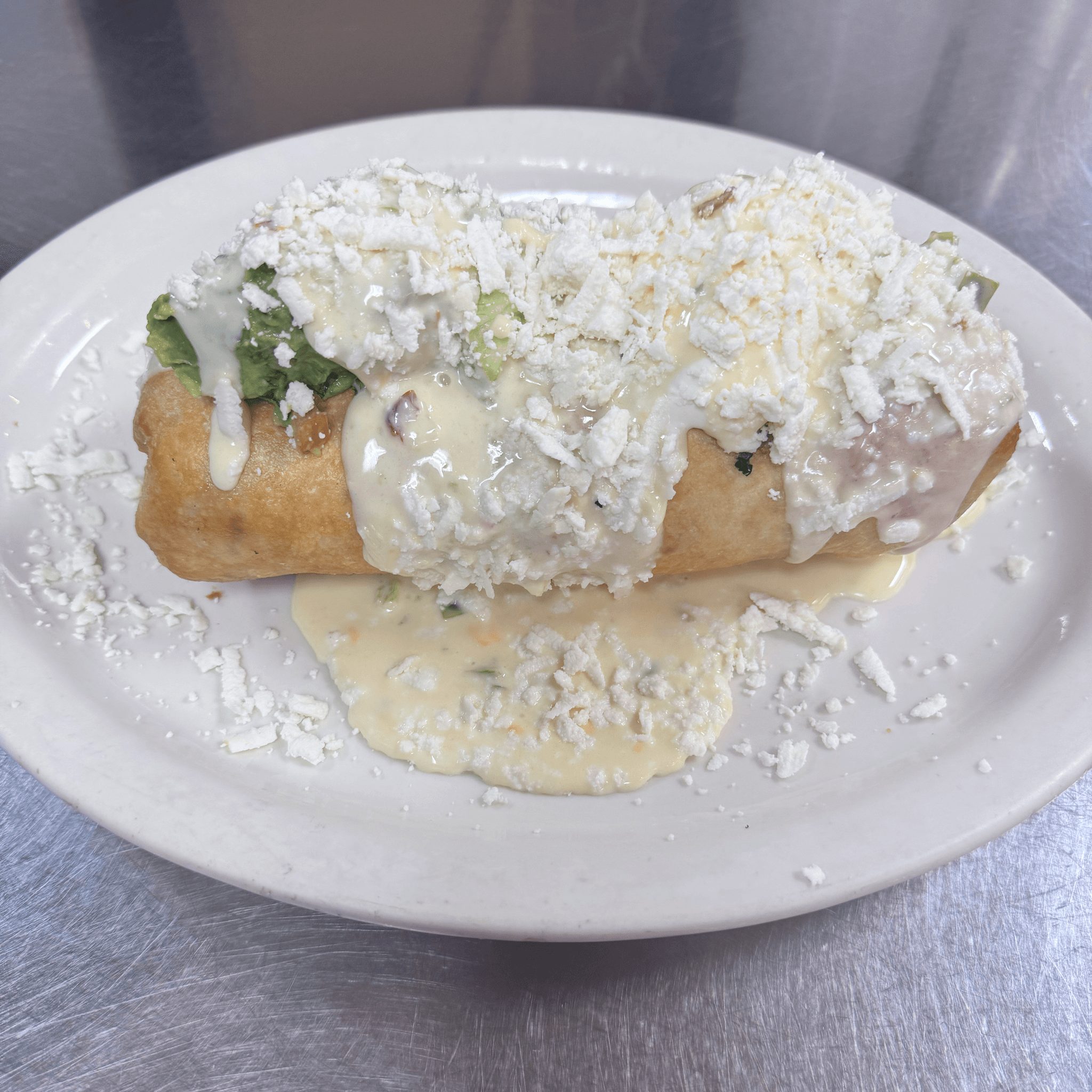 Deep-Fried Jalapeño Cheese Dipped Burrito..