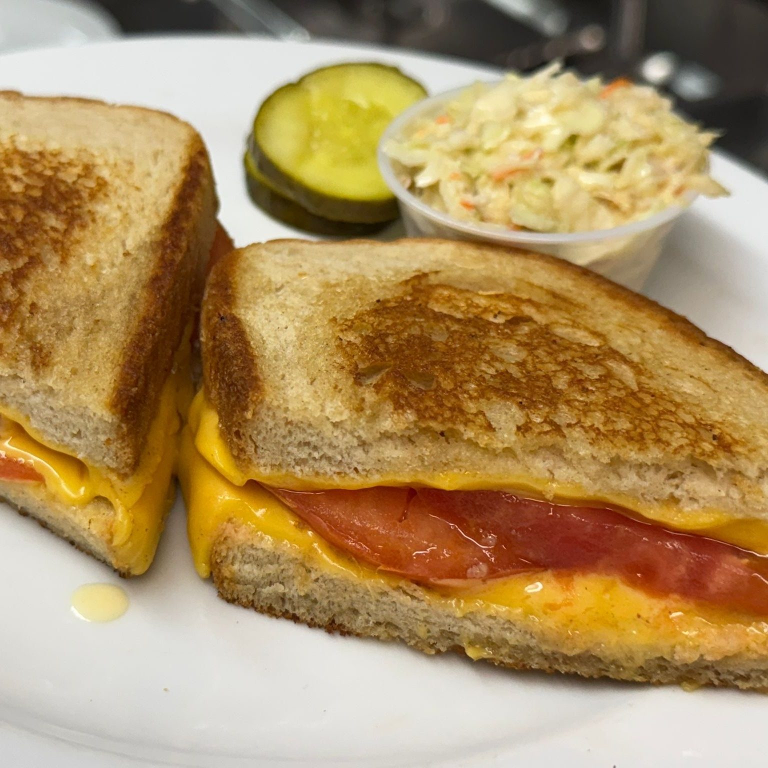 Grilled American Cheese with Tomato Sandwich.