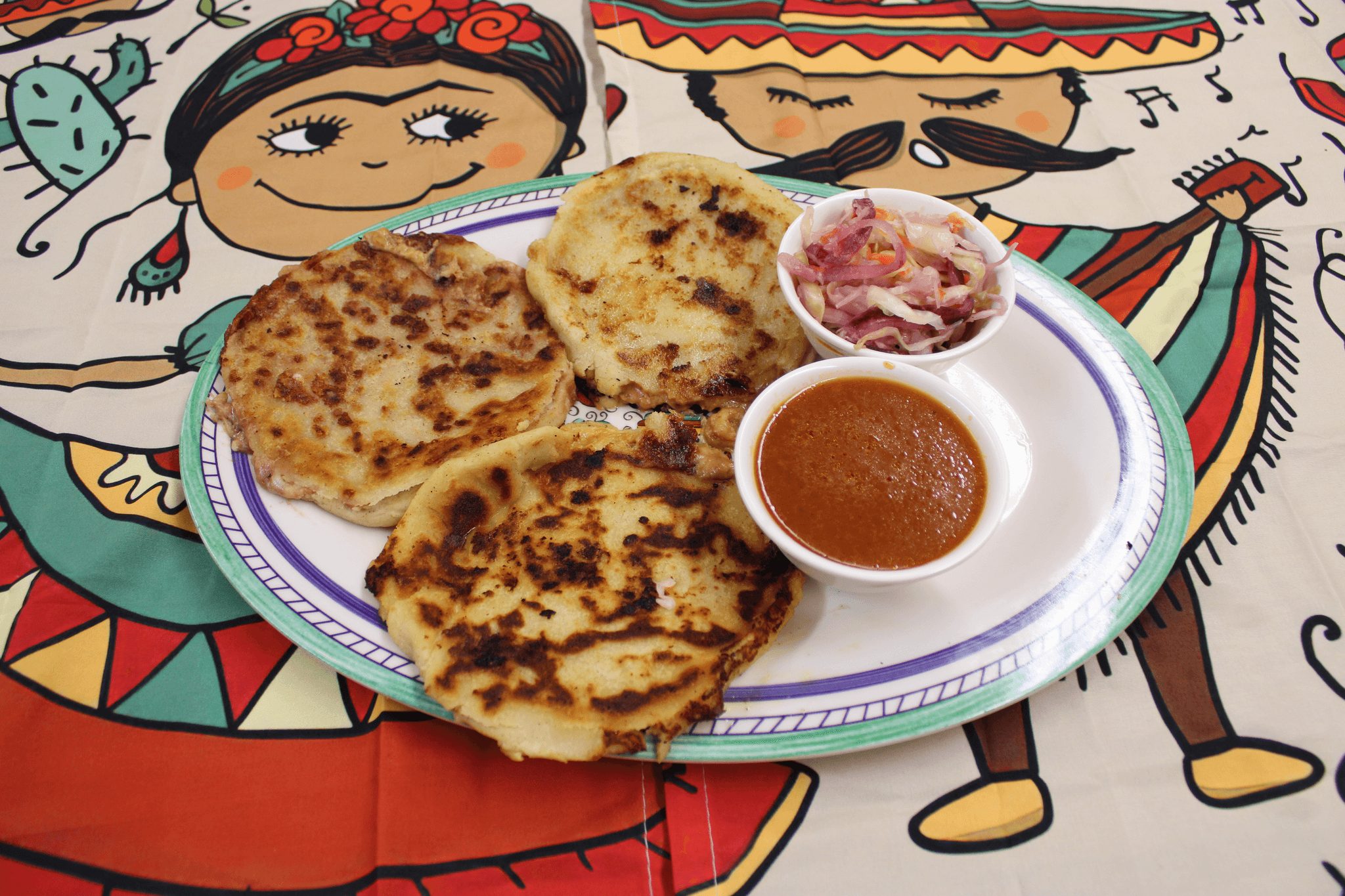 2 Pupusas Revueltas / Mixed Pupusas.