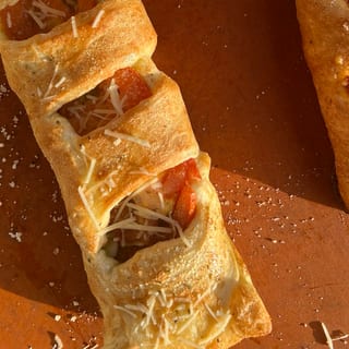 Pesto chicken tomato stuffed cane