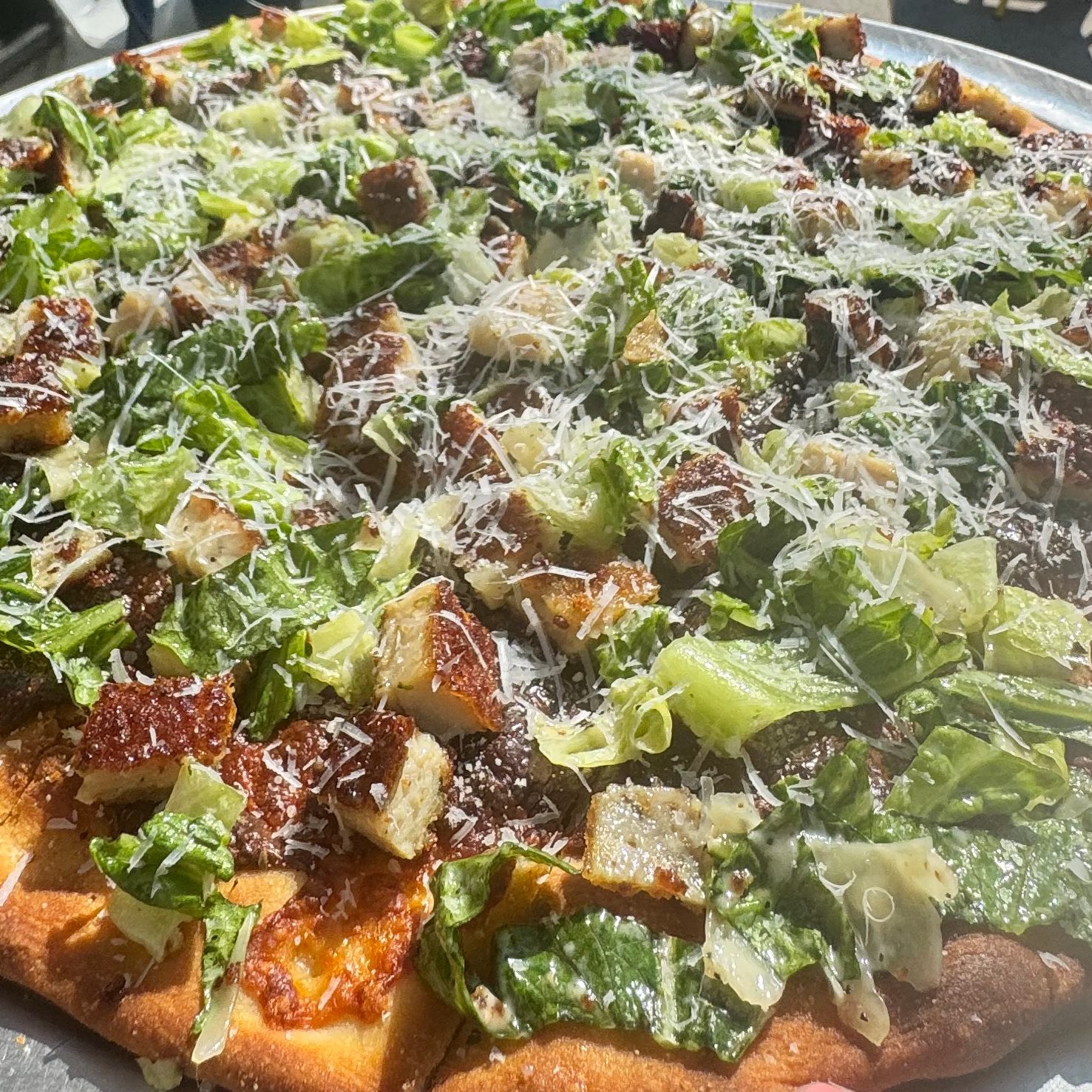Tavern Chicken Caesar Salad Pizza.