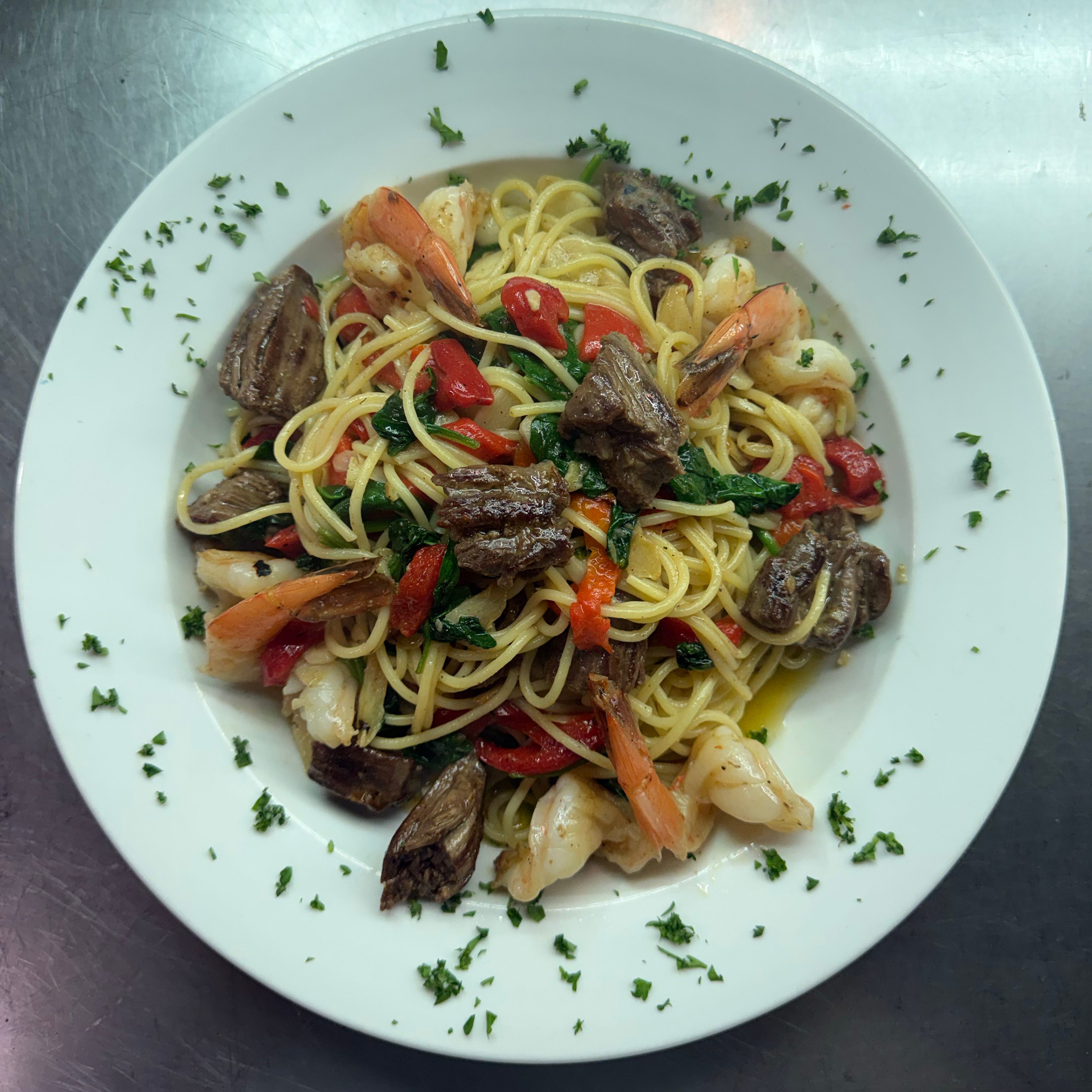 Steak & Shrimp Garlic Pasta.