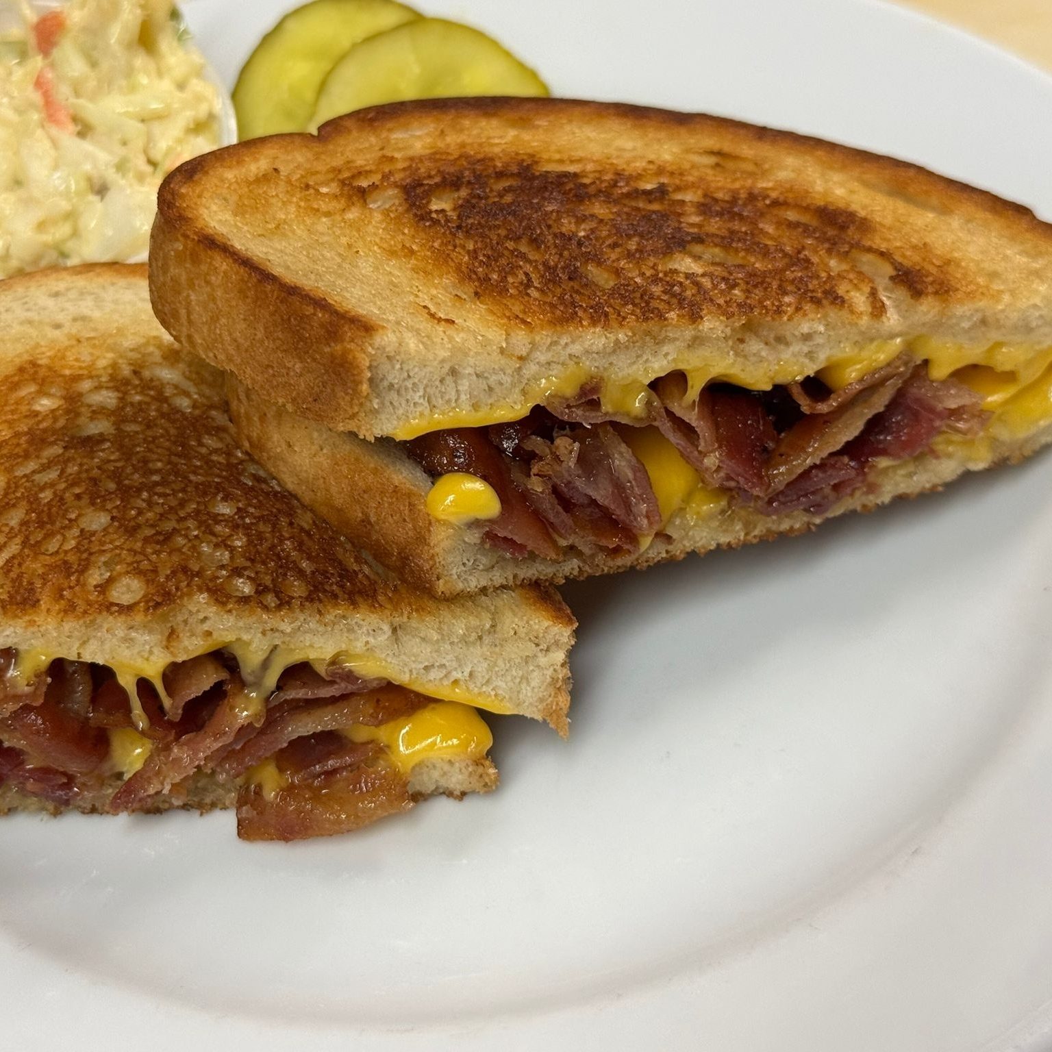 Grilled Cheddar with Bacon Sandwich.