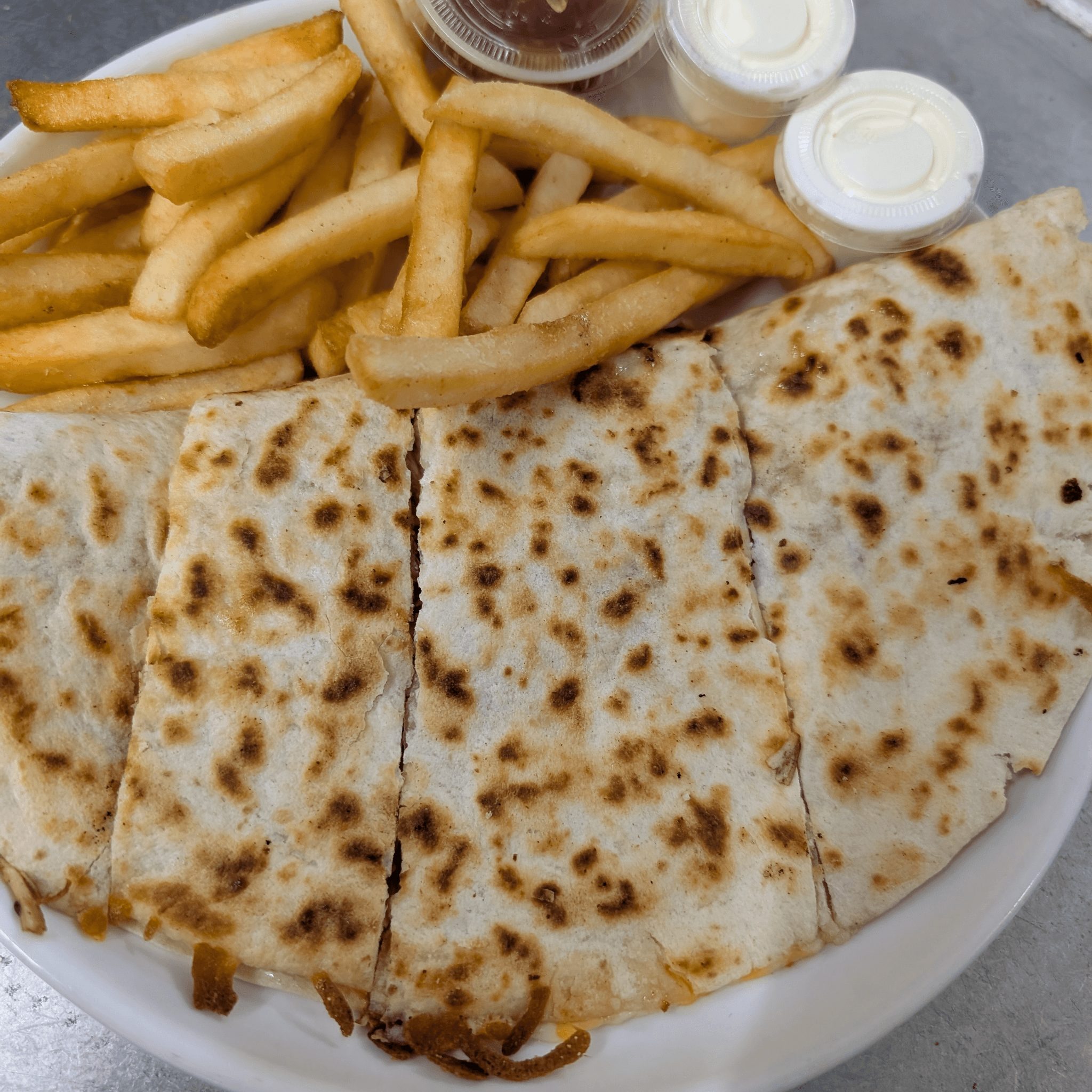 Cheese Quesadilla with French Fries or Salad.