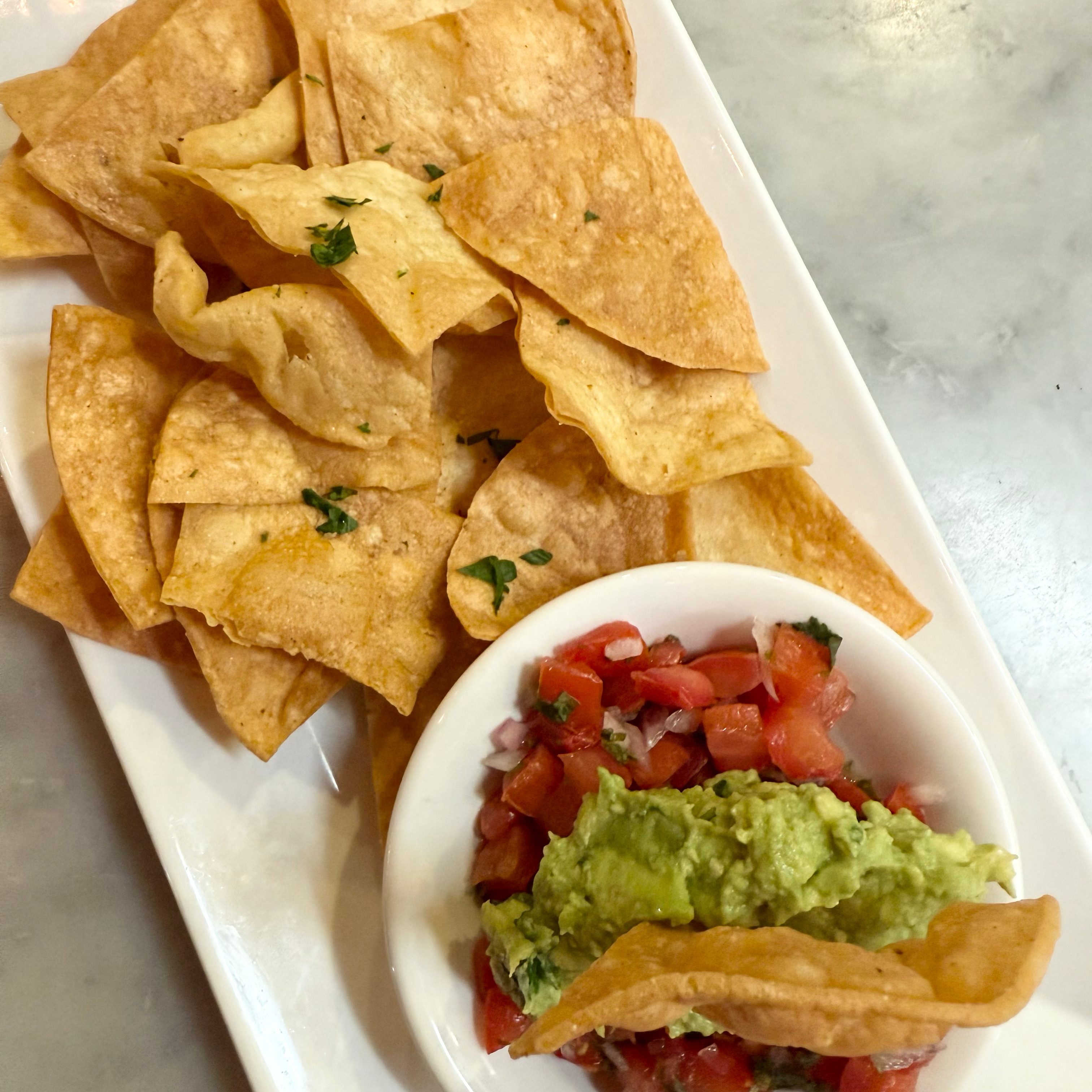 Side of guacamole & chips.