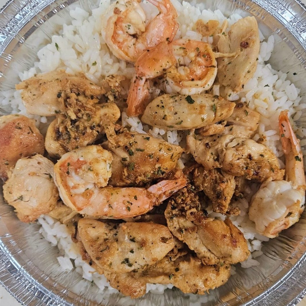 Shrimp & Chicken Scampi Over Rice.