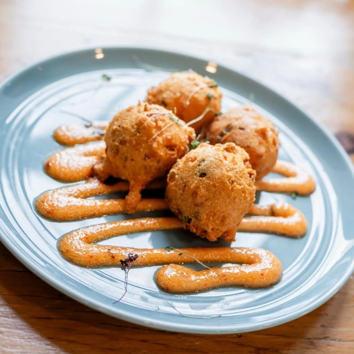 Sweet Potato & Tasso Ham Hush Puppies.
