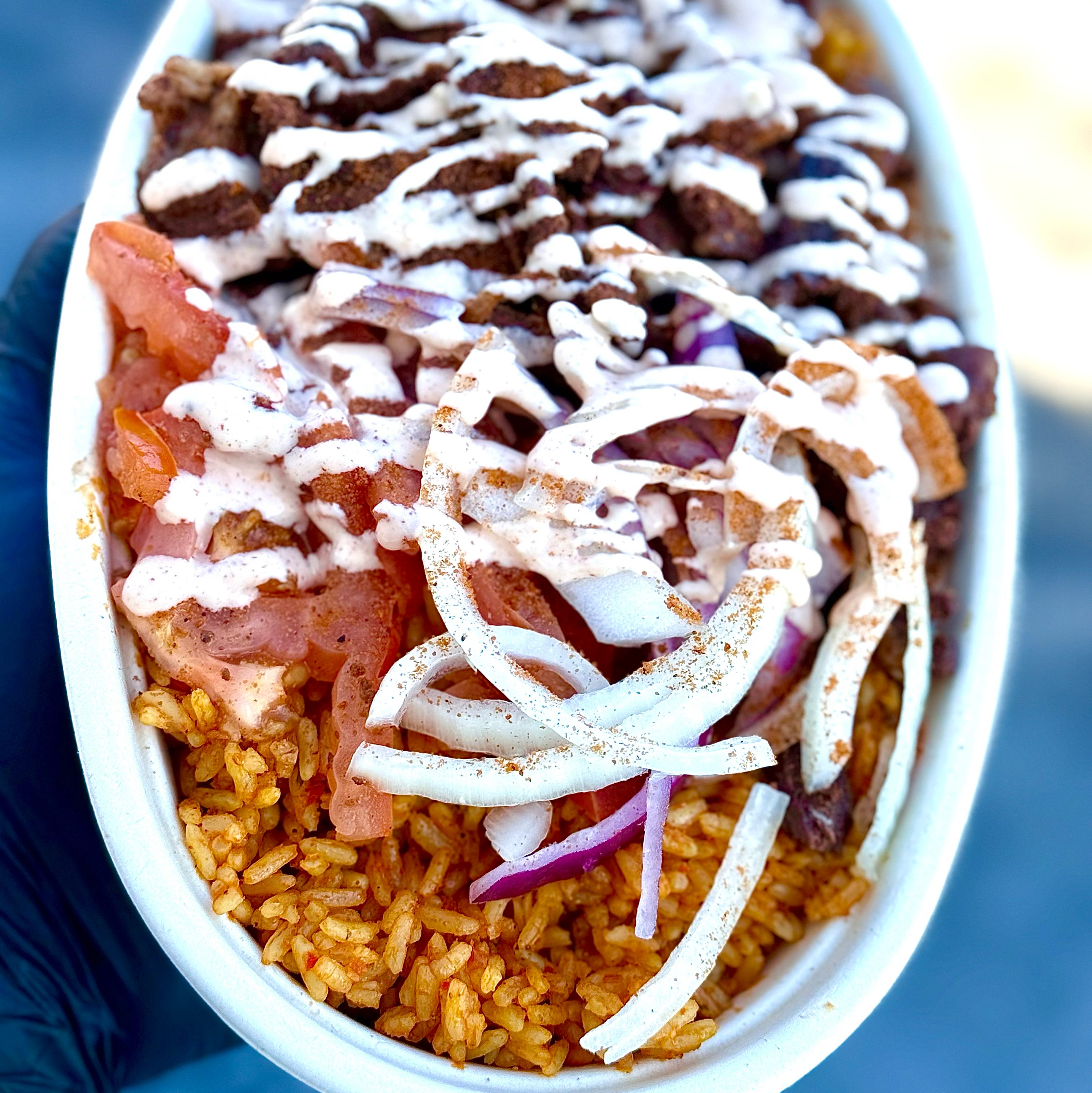 Jollof Vibes & Suya Combo.