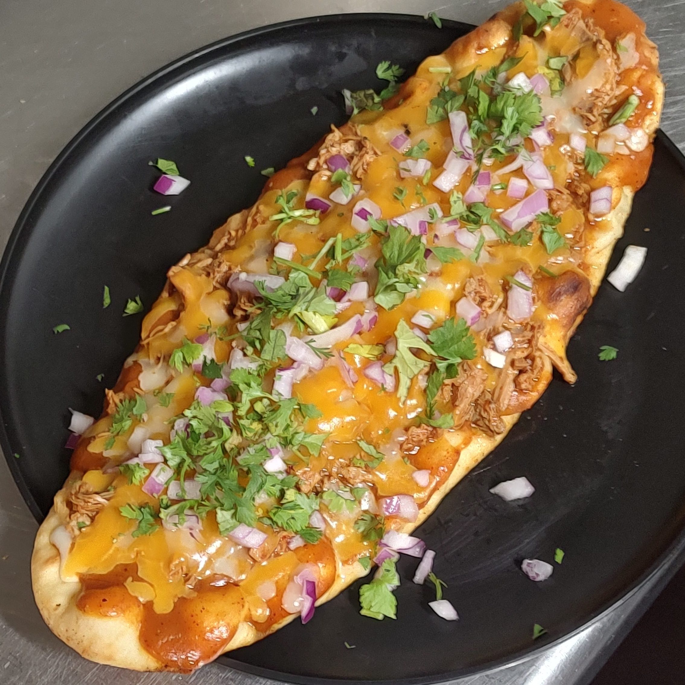Beef Birria Flat Bread Pizza.