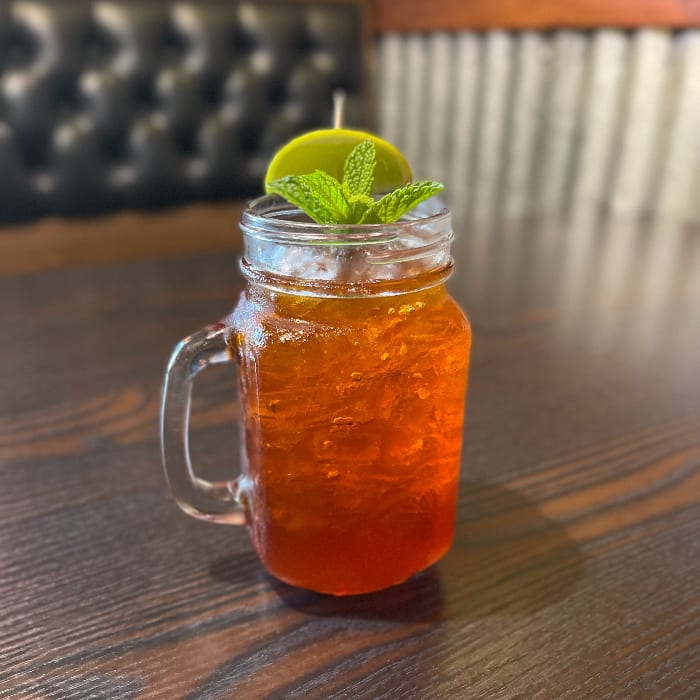 Thai Limed Iced Tea (24 oz).