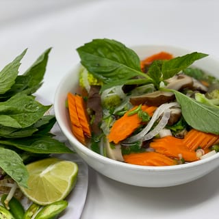 16. Steamed Vegetables, Mushrooms, Fried Tofu and Rice Noodle Soup