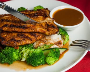 F28. Grilled Chicken Indonesian Style.