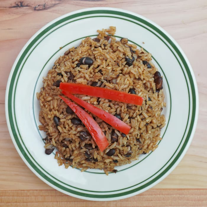 Moro De Gandules O Negro O Rojo / Mixed Rice with Beans or Red.