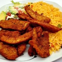 Pollo con Arroz (Breaded fried chicken ).