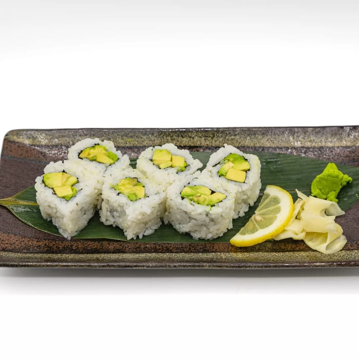 Avocado Maki with Rice Outside.