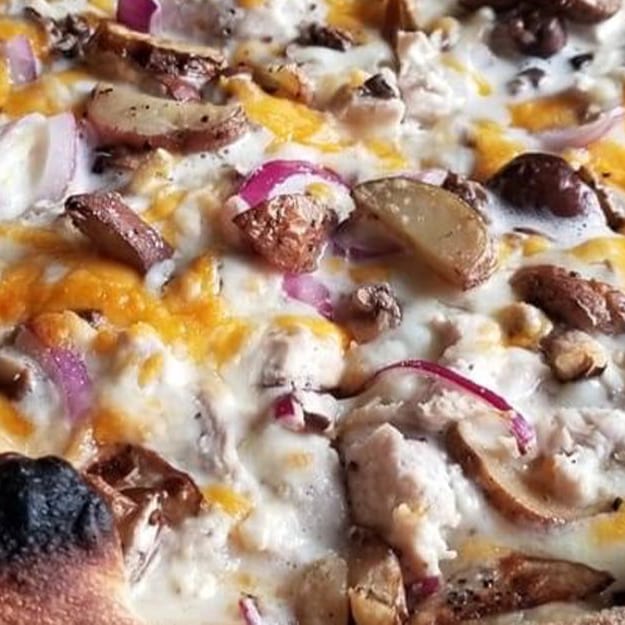 Lemon Chicken Cheddar Cauliflower Pizza.