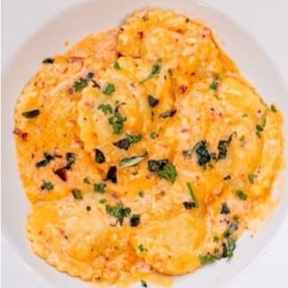 Butternut Squash Ravioli in Roasted Red Bell Pepper Sauce