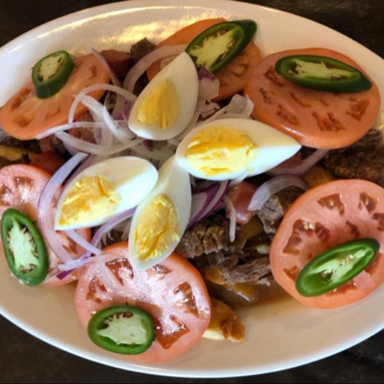 Authentic Argentinian Cuisine: Empanadas, Asado, Chimichurri