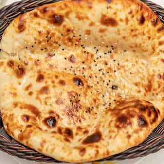 61. Garlic Naan.