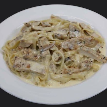 Fettuccine Alfredo with Grilled or Breaded Chicken.