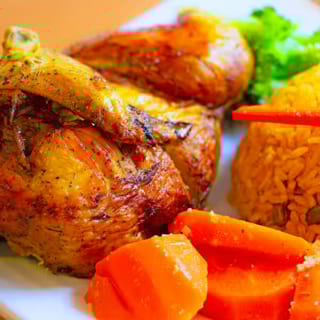 Family Combo ( Whole Rotisserie Chicken + Pork Chops, Rice-peas Or White Rice-Beans;  Or Sweet Plantains) 2 Litter Soda