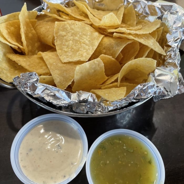 Chips and Mild, Hot or Green Salsa.